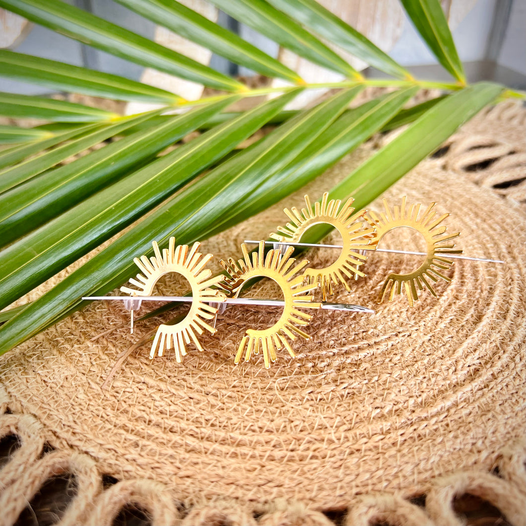 Big spiky sun earrings