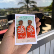 Load image into Gallery viewer, Orange arch with palm tree earrings
